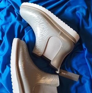 Jill Malek, Cougar X ankle boots